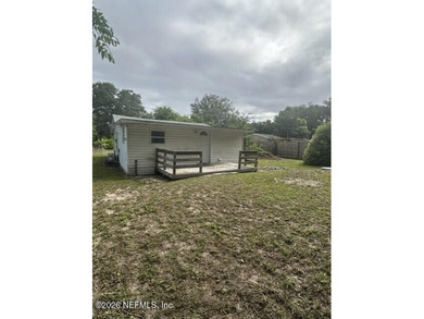 Conveniently located in the heart of Palatka, this charming - photo 4