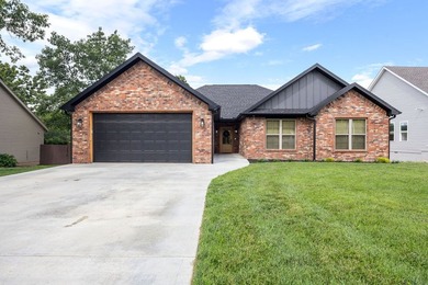 Step inside this newer home on nearly a half acre lot close to - photo 3