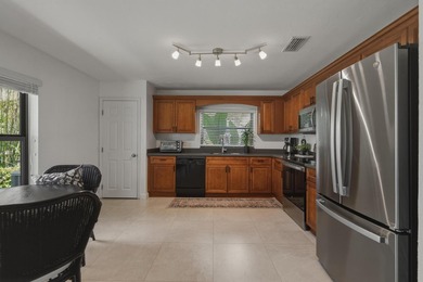 Welcome Home to your Immaculate Waterfront Corner Townhouse - photo 4