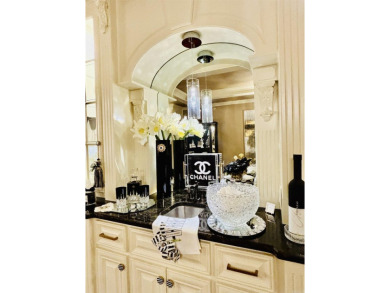 Highly desired Grand Isle Condominium fabulously designed! This