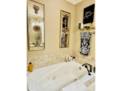 Highly desired Grand Isle Condominium fabulously designed! This