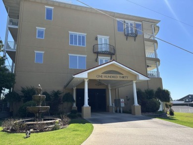 Highly desired Grand Isle Condominium fabulously designed! This