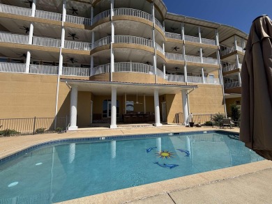 Highly desired Grand Isle Condominium fabulously designed! This