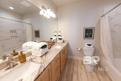 Experience coastal living at its finest with this beautifully - photo 12