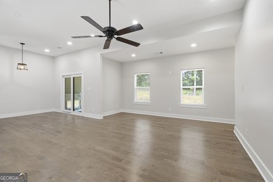 Discover this stunning four-bedroom, three-bath home located in - photo 13
