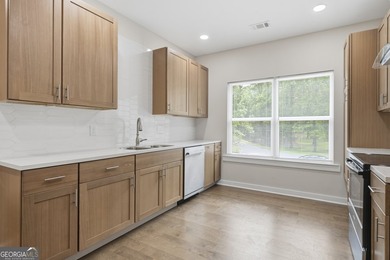 Discover this stunning four-bedroom, three-bath home located in - photo 18