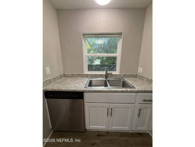 Charming three bedroom/two full bath located in the desirable - photo 3