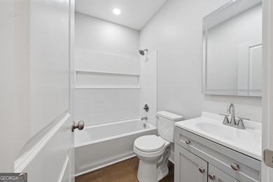 Discover this stunning four-bedroom, three-bath home located in - photo 32