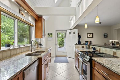 This two-level condominium offers a spacious and comfortable - photo 8