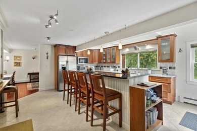 This two-level condominium offers a spacious and comfortable - photo 9