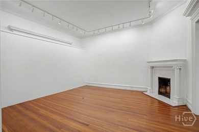 An iconic Starland District property, The Cedar House Gallery is - photo 8