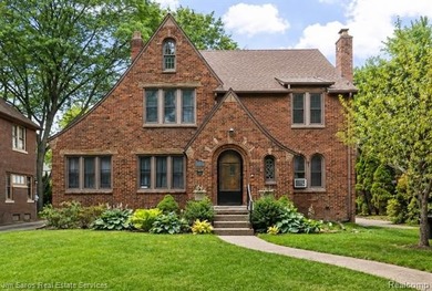 Welcome home to this timeless brick Tudor in the heart of Grosse - photo 1