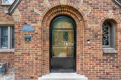 Welcome home to this timeless brick Tudor in the heart of Grosse - photo 3