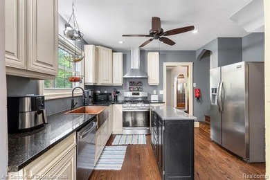 Welcome home to this timeless brick Tudor in the heart of Grosse - photo 6