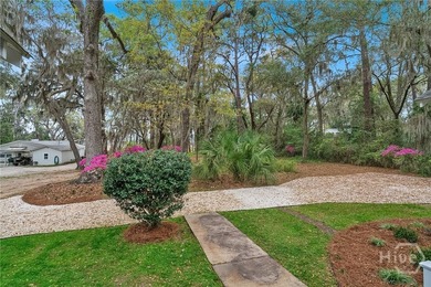 This beautifully restored Lowcountry bungalow blends modern - photo 3