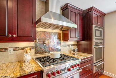 Set on a private and beautifully landscaped .8-acre property - photo 11