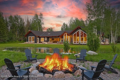 Situated on over 4 acres in the coveted Teton Cascades - photo 2