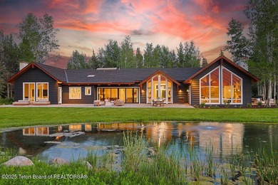 Situated on over 4 acres in the coveted Teton Cascades - photo 4