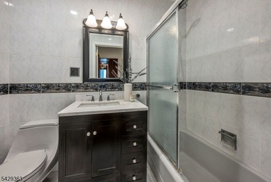 Set on a private and beautifully landscaped .8-acre property - photo 28
