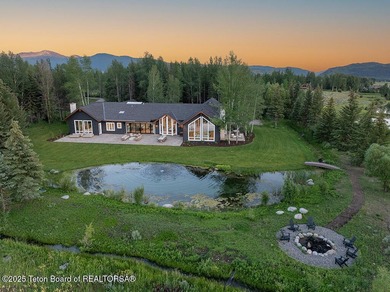 Situated on over 4 acres in the coveted Teton Cascades - photo 8