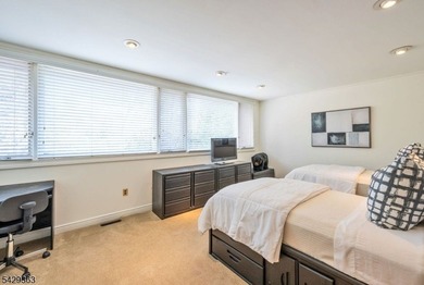 Set on a private and beautifully landscaped .8-acre property - photo 29