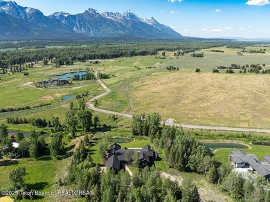 Situated on over 4 acres in the coveted Teton Cascades - photo 9