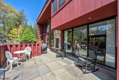Set on a private and beautifully landscaped .8-acre property - photo 35