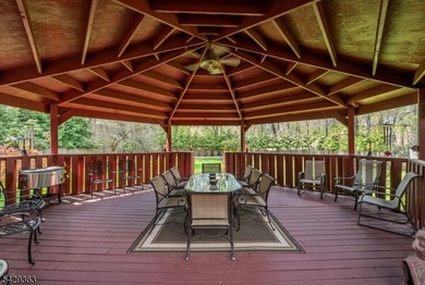 Set on a private and beautifully landscaped .8-acre property - photo 36