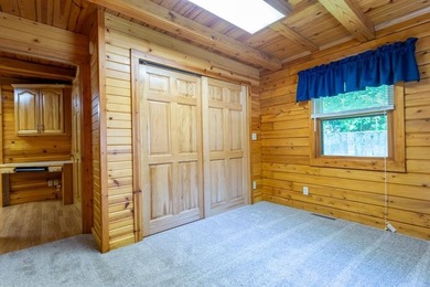 Welcome to your peaceful log home retreat! Nestled in a serene - photo 12