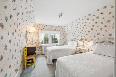 Tucked away on a desirable village street, this circa-1927 home - photo 13