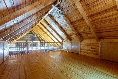 Welcome to your peaceful log home retreat! Nestled in a serene - photo 14