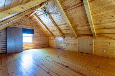 Welcome to your peaceful log home retreat! Nestled in a serene - photo 15