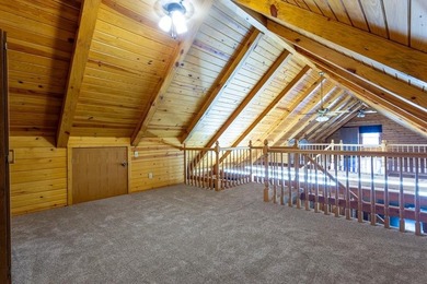 Welcome to your peaceful log home retreat! Nestled in a serene - photo 16