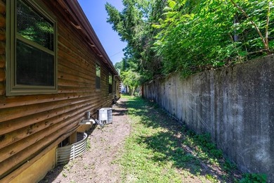 Welcome to your peaceful log home retreat! Nestled in a serene - photo 23