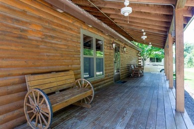 Welcome to your peaceful log home retreat! Nestled in a serene - photo 24