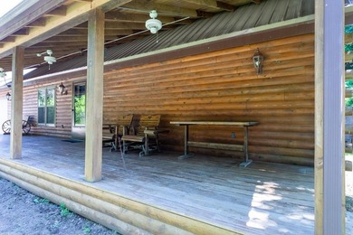 Welcome to your peaceful log home retreat! Nestled in a serene - photo 26