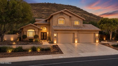 Tucked away on nearly 3/4 of an acre in the prestigious - photo 1