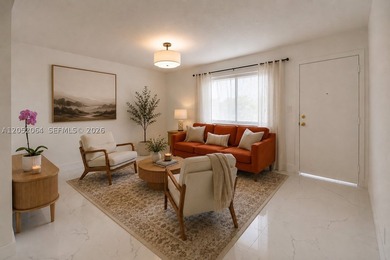 Welcome to this beautifully renovated first-floor condo in the - photo 1