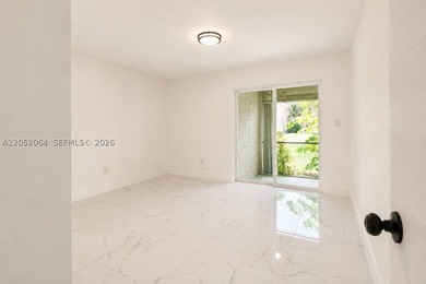 Welcome to this beautifully renovated first-floor condo in the - photo 8