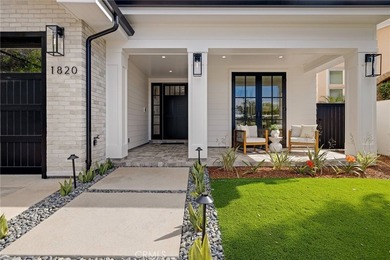 This newly constructed masterpiece in Manhattan Beach offers 6