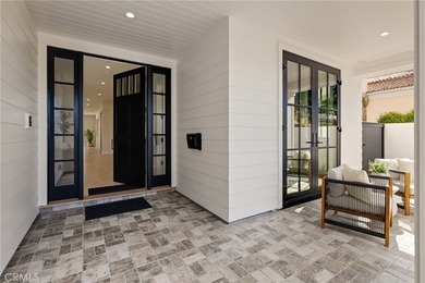 This newly constructed masterpiece in Manhattan Beach offers 6