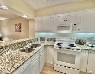 Updated two bedroom, two bath lakefront condo just steps from