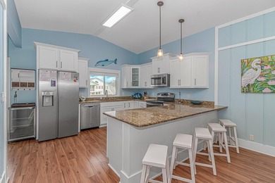 Newly renovated raised beach house located in the highly - photo 12