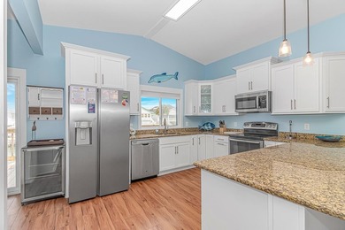 Newly renovated raised beach house located in the highly - photo 13