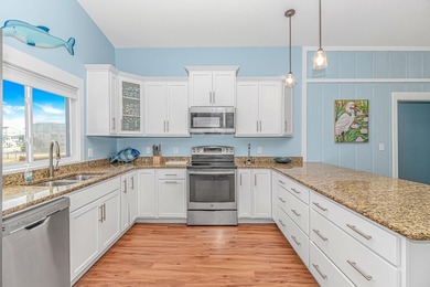Newly renovated raised beach house located in the highly - photo 14