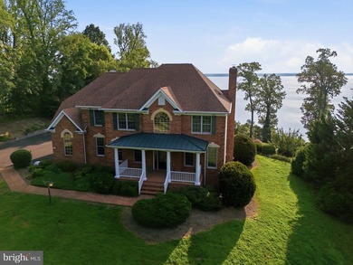 Absolutely stunning brick front colonial on over 2.75 acres with - photo 1