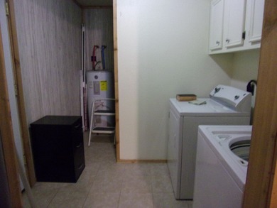 Attractive, log type home sitting on three lots, fenced,  with