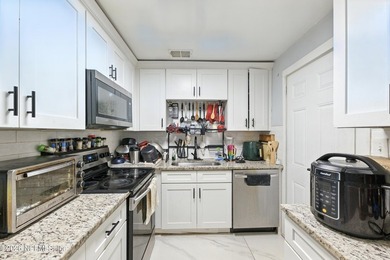 HUGE PRICE IMPROVEMENT on this 4-bedroom, 2-bath home is full of - photo 12