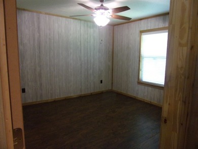 Attractive, log type home sitting on three lots, fenced,  with