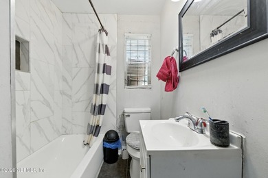 HUGE PRICE IMPROVEMENT on this 4-bedroom, 2-bath home is full of - photo 14